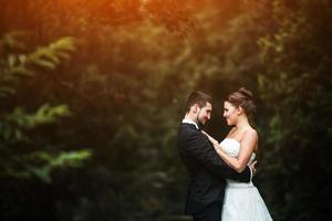 Beautiful wedding couple posing photo