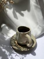 coffee cup on table photo