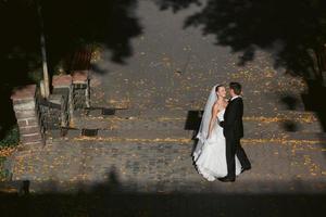 Lovely couple illuminated by the sun photo