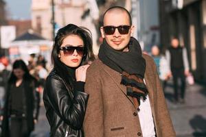 Couple walking and posing on the street photo