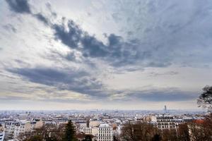 grey clouds under big city, Paris photo