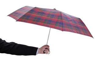 male hand with small open telescopic umbrella photo