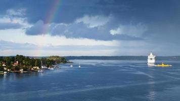 panorama with white cruise liner in Baltic Sea photo