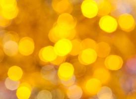 yellow blurred shimmering Christmas lights photo