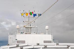 flags of european countries on cruise liner photo