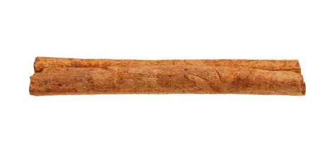 dried brown rolled Cinnamon stick isolated photo