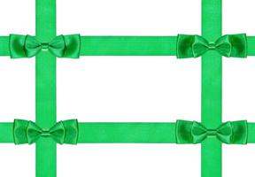 four double green bow knots on four satin ribbons photo