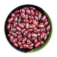 top view of raw mexican red beans in round bowl photo