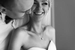 Lovely couple in the hotel room photo