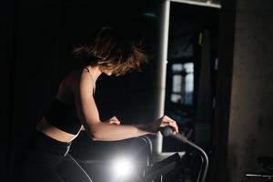 Young woman are engaged in a gym, girls in a gym. photo