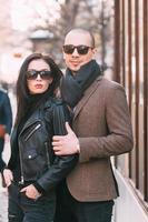 Couple walking and posing on the street photo
