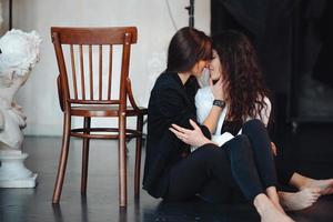 Two girls in each other's tender embraces photo