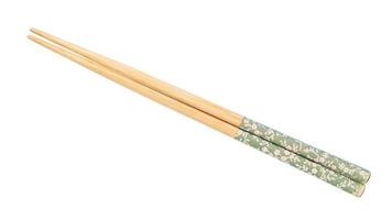 decorated wooden chopsticks put together isolated photo