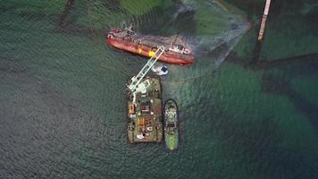 View of an old tanker that ran aground and overturned photo