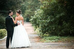 Beautiful wedding couple posing photo