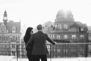 Couple in love on roof in old city photo