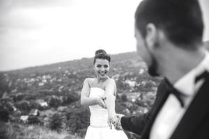 Wedding couple posing for the camera photo