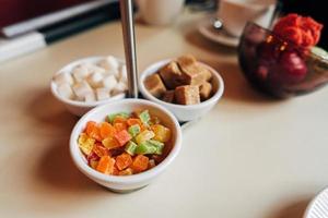 colored fruit sugar on the table photo