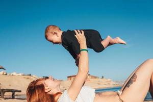 Happy family - mother and small baby son photo