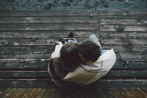 Young couple wrapped in plaid photo