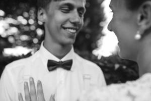 Bride and groom in the forest photo