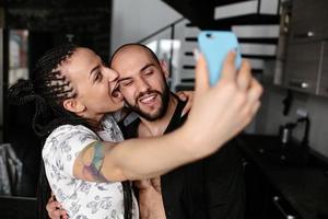 man and woman making selfie photo