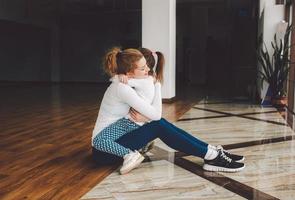 Charming family spends time in the gym photo