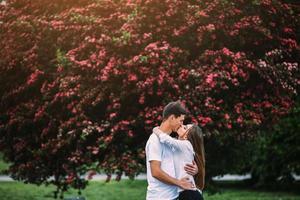 Young happy couple in love outdoors photo
