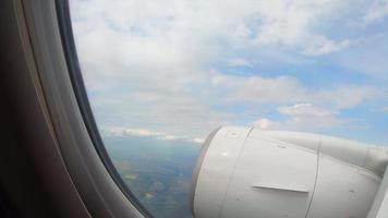 View from the window of a passenger airplane of a landscape photo