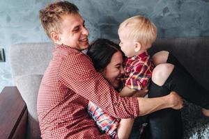 Happy family on the couch photo