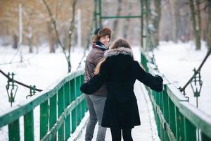 beautiful couple on a bridge photo