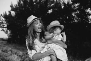 mother and daughter together outdoors photo