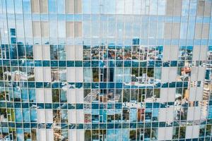 Street reflection on glass steel building facade photo