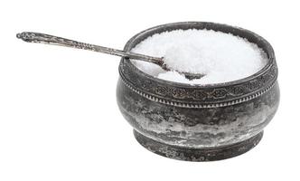 silver salt cellar with spoon with ground Sea Salt photo