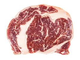 top view of uncooked ribeye beef steak isolated photo