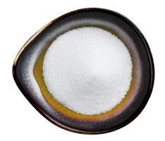 crystalline extract of stevia in bowl isolated photo