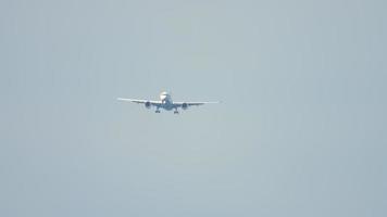 Widebody airliner on final approach before landing at the Phuket airport. Mai Khao beach video