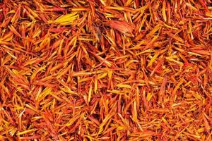 background - many dried safflower petals photo