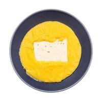 top view of cooked maize porridge with cheese photo