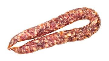 whole dry-cured sausage isolated on white photo