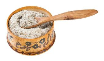 wooden salt cellar with spoon with seasoned salt photo