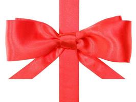 real red bow with horizontal cut ends on ribbon photo