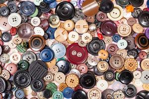 top view of pile of many different buttons photo