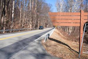 wooden road sign photo