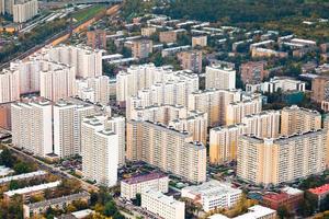 block of modern houses in autumn day photo