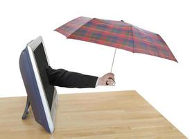 hand with checkered umbrella pops out TV screen photo