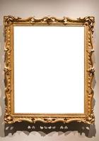 vertical old baroque painting frame on wall photo