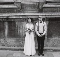 The bride and groom posing photo