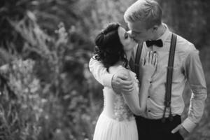 bride and groom kissing photo