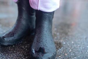 Close up of galoshes on a rainy day photo